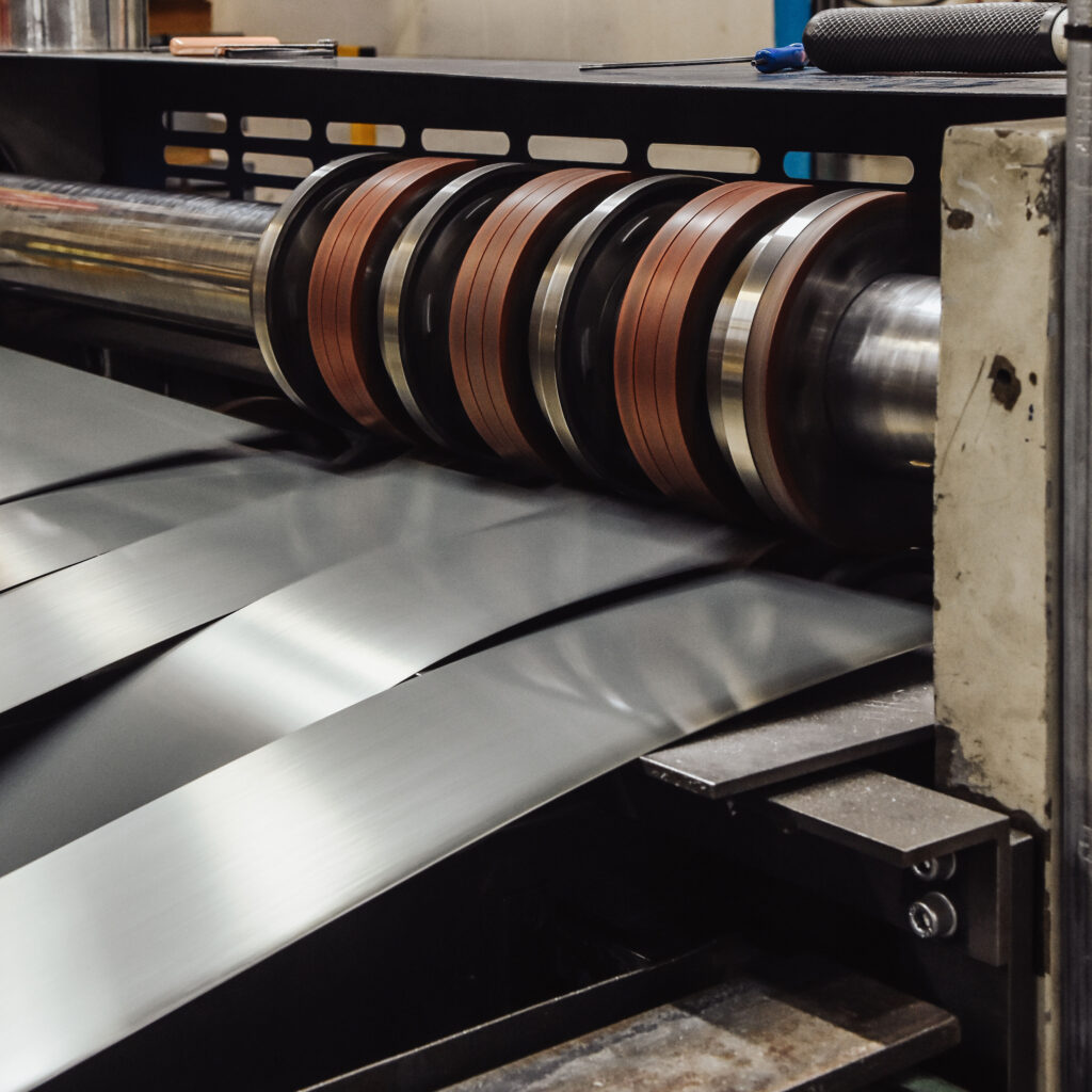 Berg Tins Website 2 Tinplate being cut in the Sure-Can factory